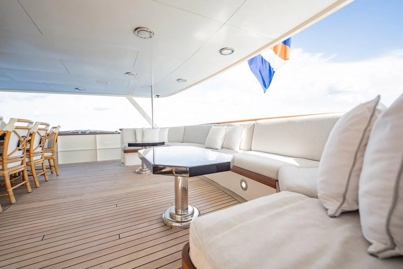 a room with a couch and a table aboard BG Yacht for Sale