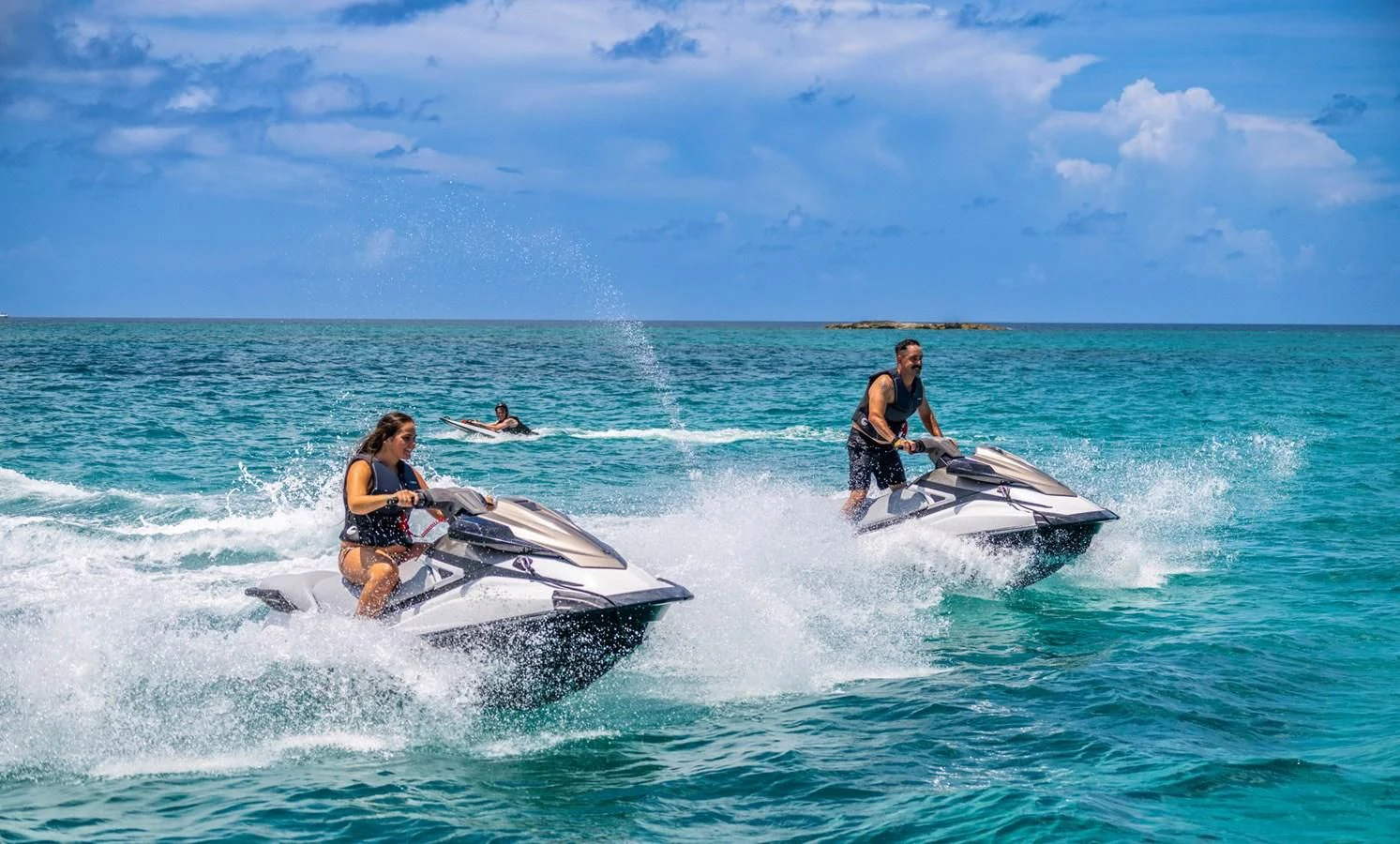people on a jet ski aboard BG Yacht for Sale