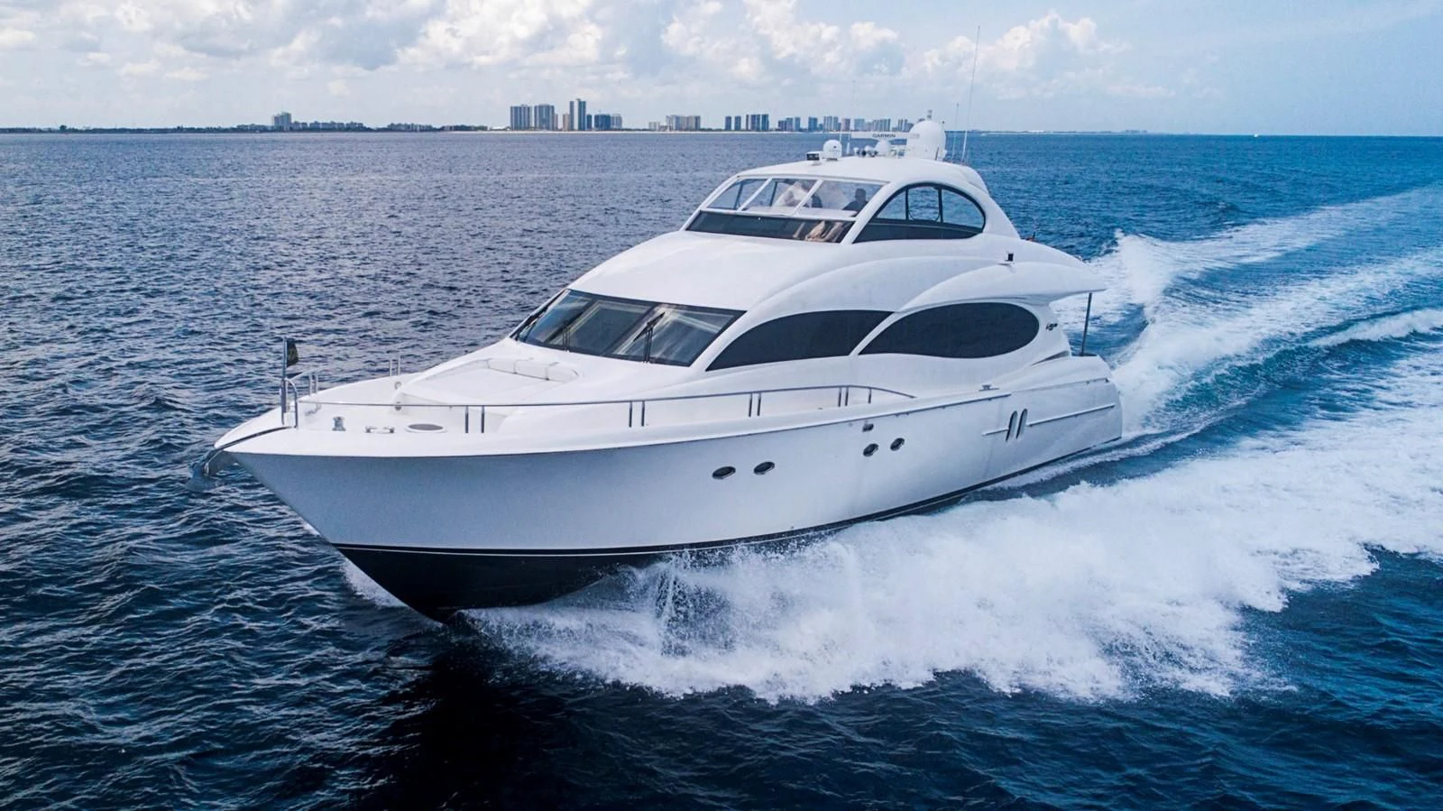 a white yacht on the water aboard RENDEZVOUS Yacht for Sale