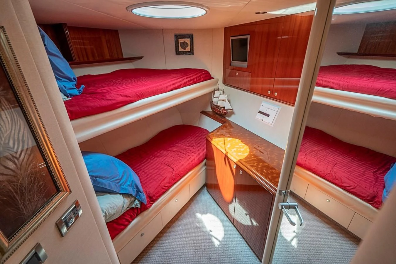 a room with bunk beds aboard RENDEZVOUS Yacht for Sale