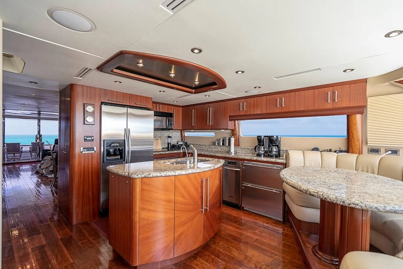 a large kitchen with a large island aboard RENDEZVOUS Yacht for Sale
