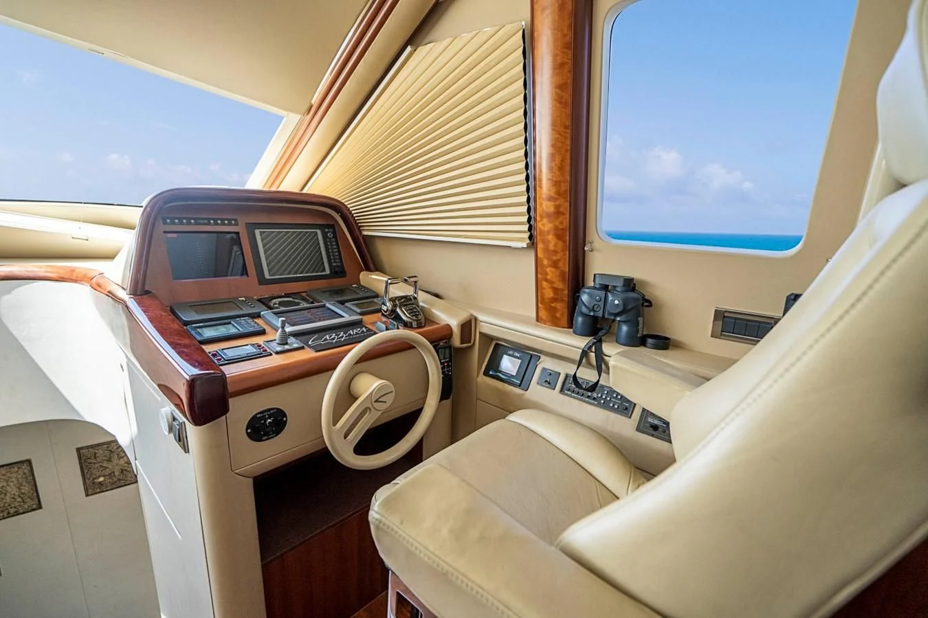 a plane with a desk and a laptop on it aboard RENDEZVOUS Yacht for Sale