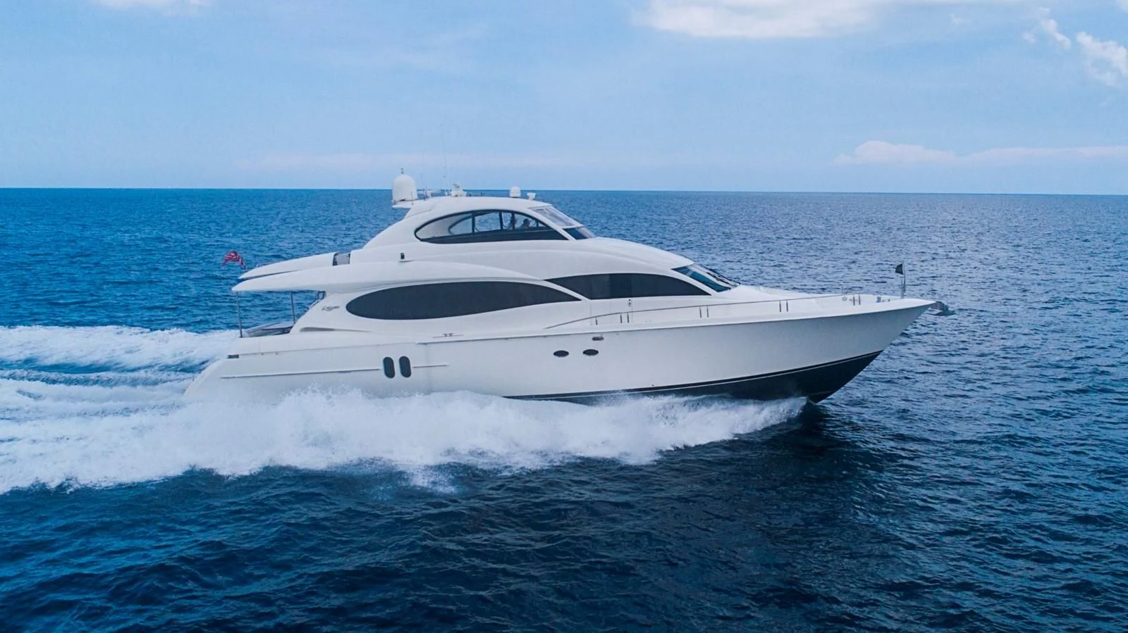 a white yacht in the water aboard RENDEZVOUS Yacht for Sale
