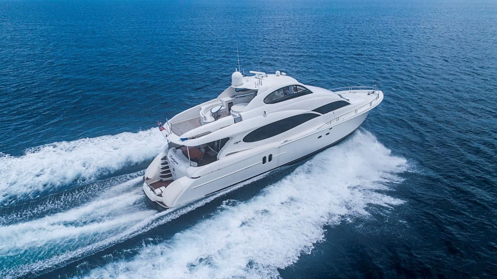 a white yacht in the water aboard RENDEZVOUS Yacht for Sale