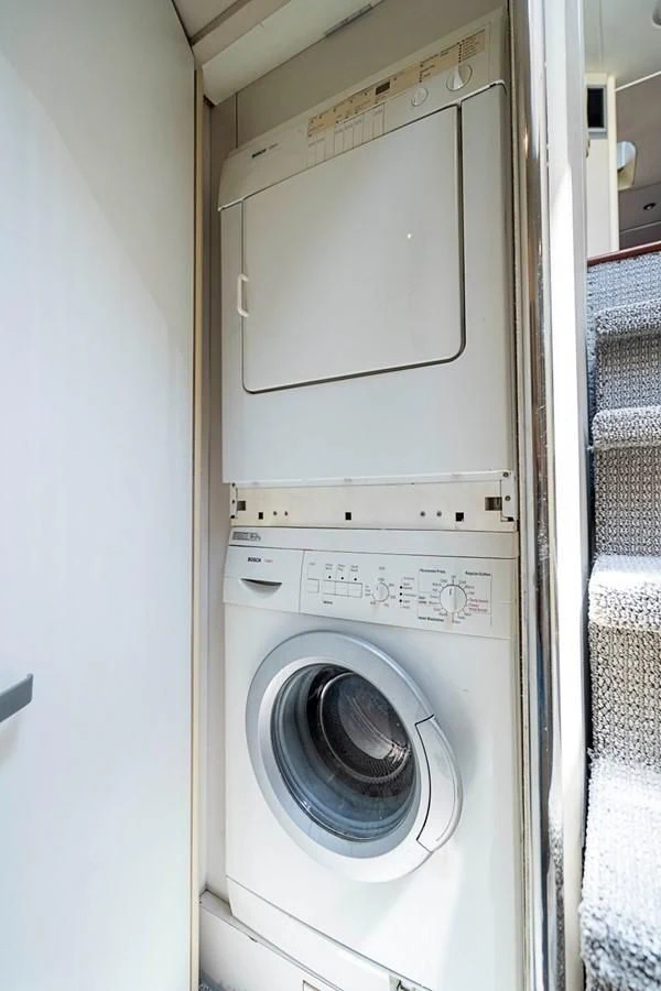 a white washing machine aboard RENDEZVOUS Yacht for Sale