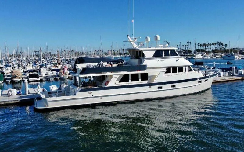a white yacht in the water aboard AL DI LA Yacht for Sale