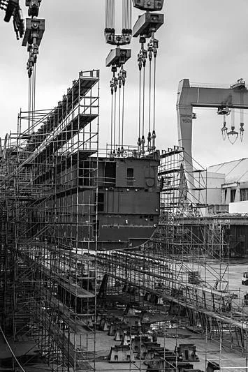 a large crane on a building aboard BLACK SHARK Yacht for Sale