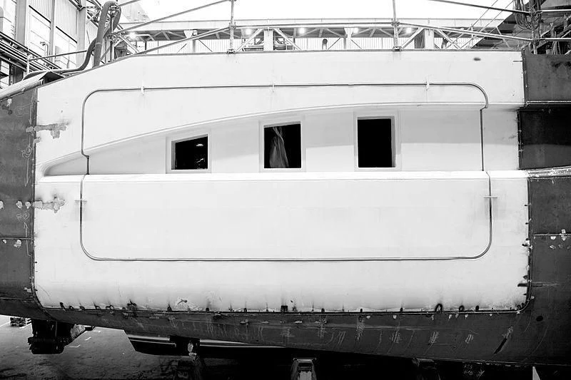 a train car with no roof aboard BLACK SHARK Yacht for Sale