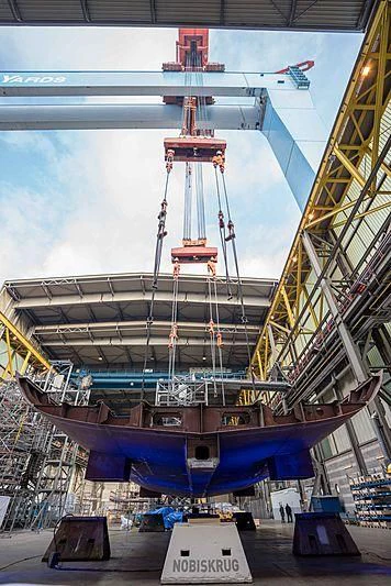a large ship in a dock aboard BLACK SHARK Yacht for Sale