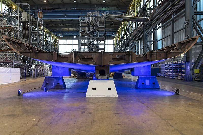a large machine in a factory aboard BLACK SHARK Yacht for Sale
