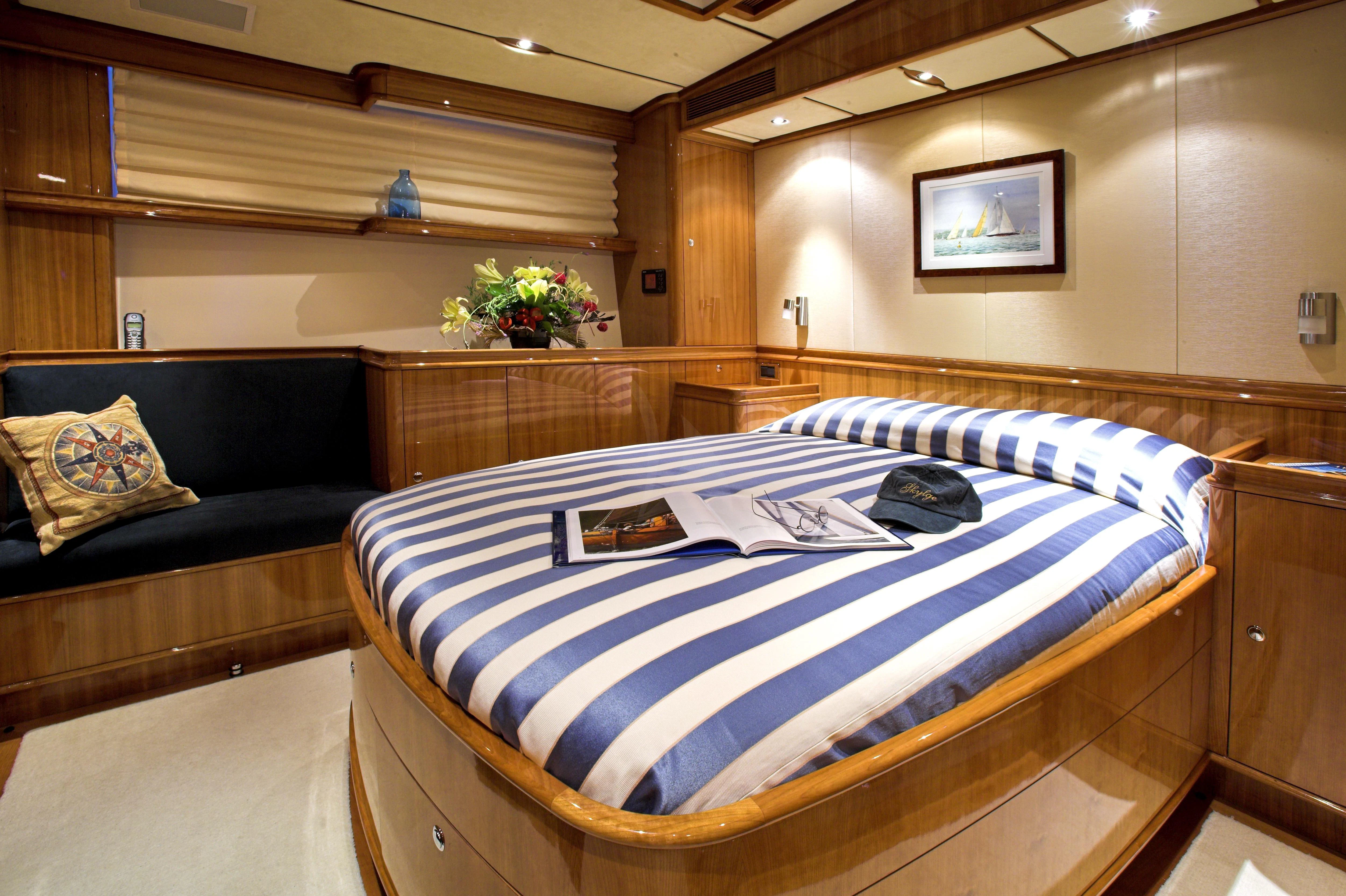 a bed in a room aboard SEABISCUIT Yacht for Sale