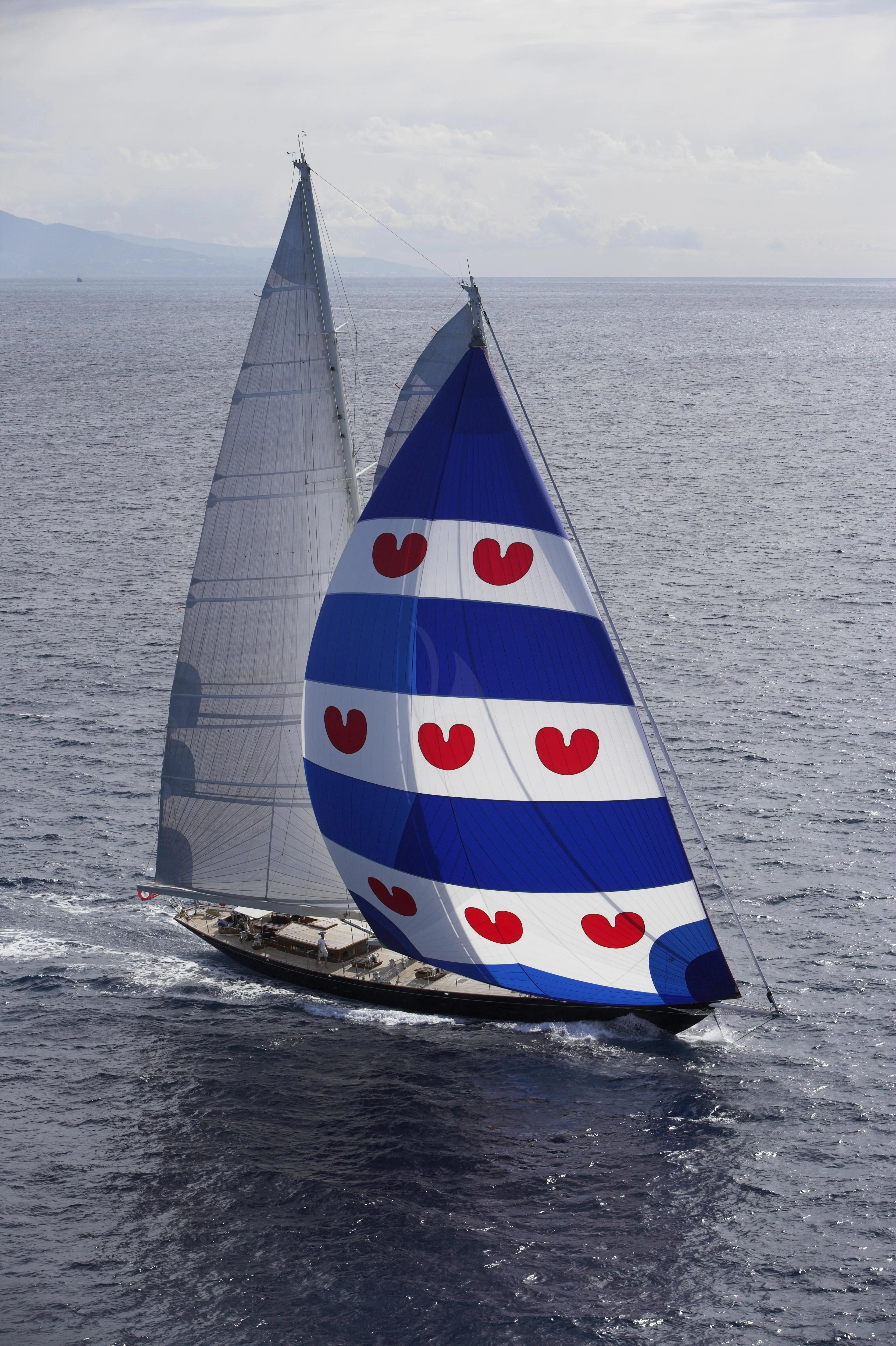 a couple of sailboats in the water aboard SEABISCUIT Yacht for Sale