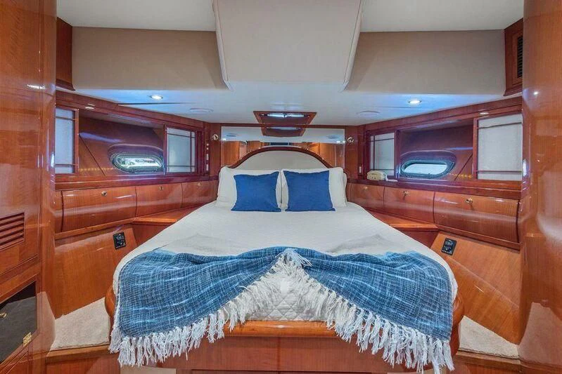 a bed in a cabin aboard MENTORSHIP IV Yacht for Sale