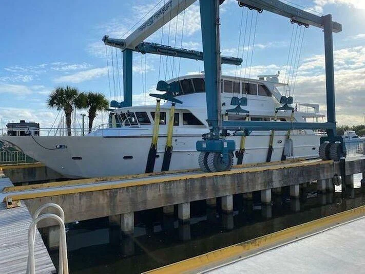 a boat on a dock aboard MENTORSHIP IV Yacht for Sale