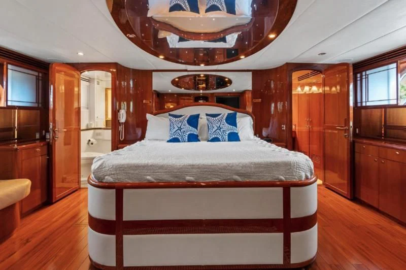 a bed in a room aboard MENTORSHIP IV Yacht for Sale