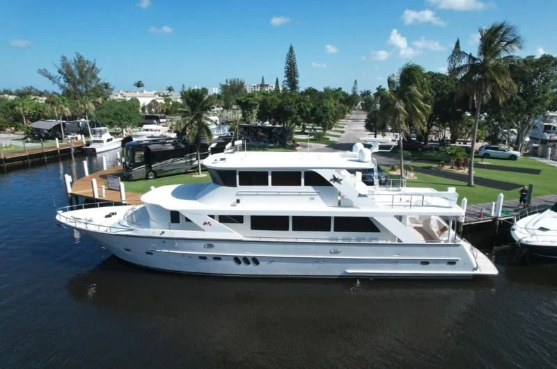 a boat docked at a pier aboard MENTORSHIP IV Yacht for Sale