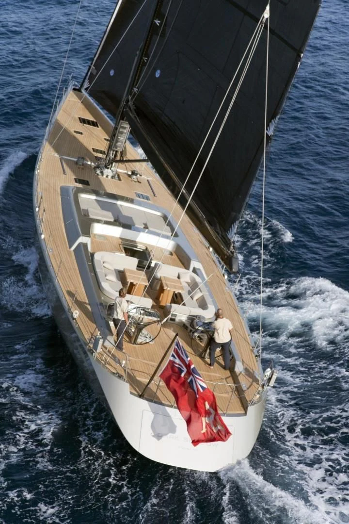 a boat with a sail aboard RUNNING ON FAITH Yacht for Sale