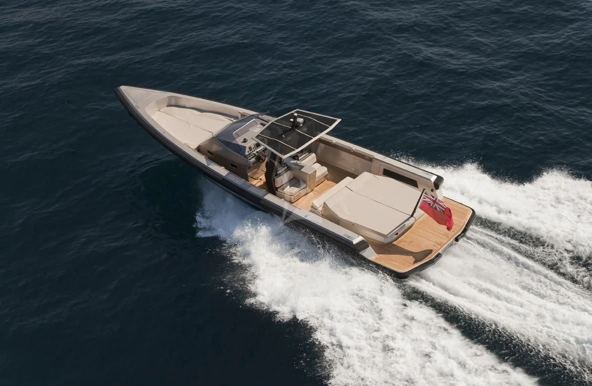 a boat on the water aboard RUNNING ON FAITH Yacht for Sale