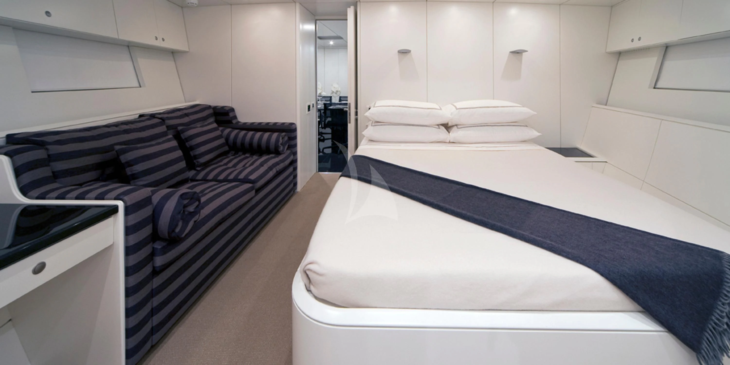 a room with a bed and a desk aboard RUNNING ON FAITH Yacht for Sale