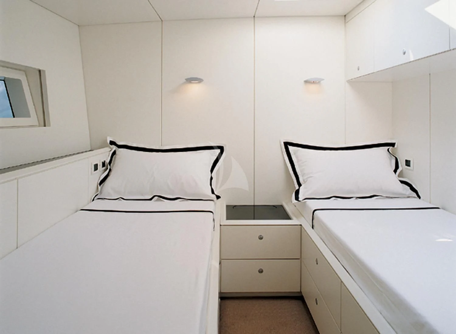 a couple of beds in a room aboard RUNNING ON FAITH Yacht for Sale