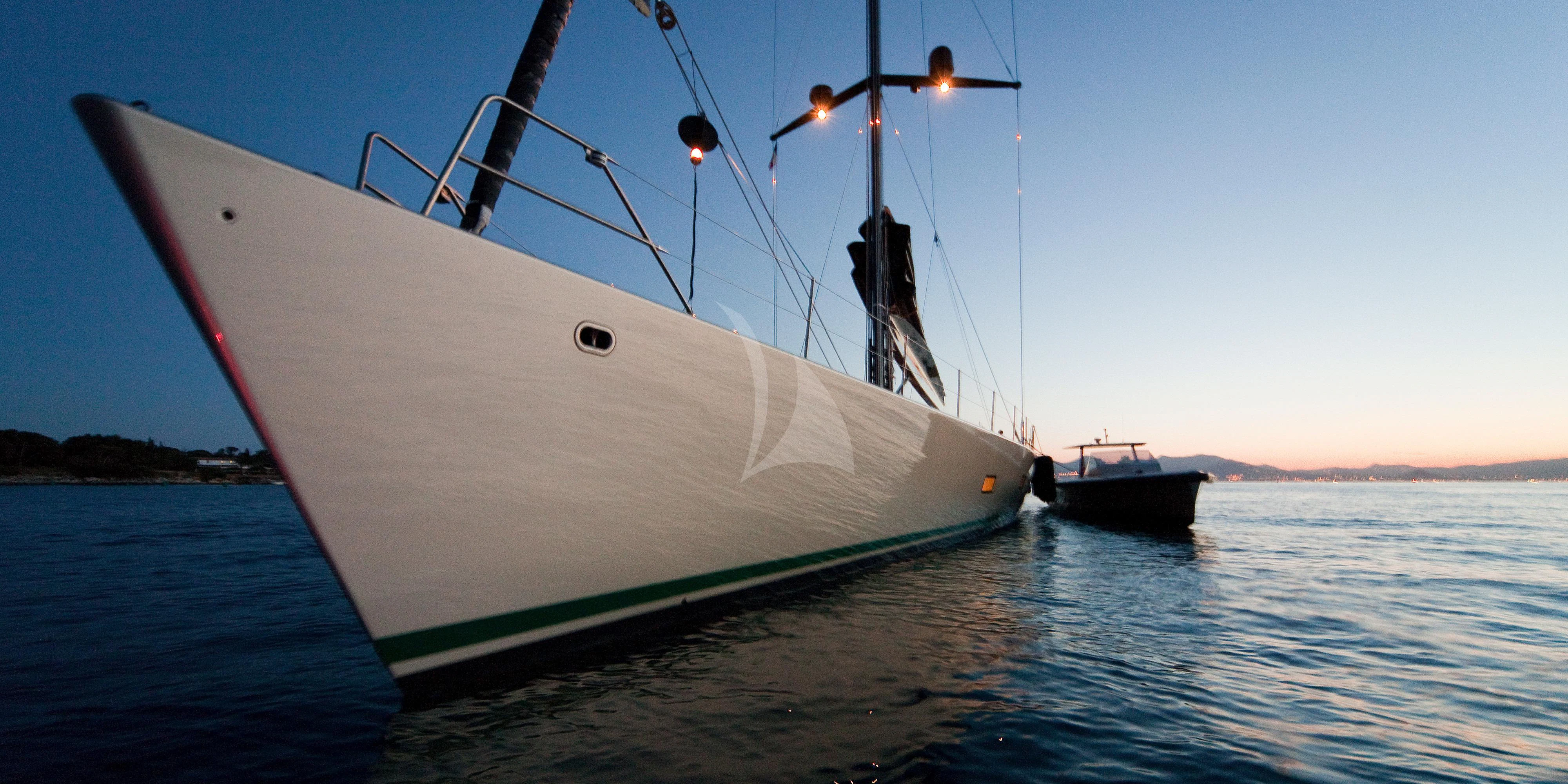 a sailboat on the water aboard RUNNING ON FAITH Yacht for Sale