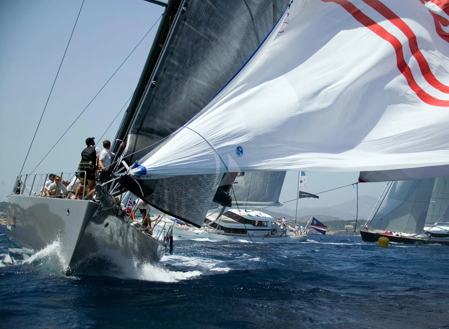a group of people on a sailboat aboard RUNNING ON FAITH Yacht for Sale