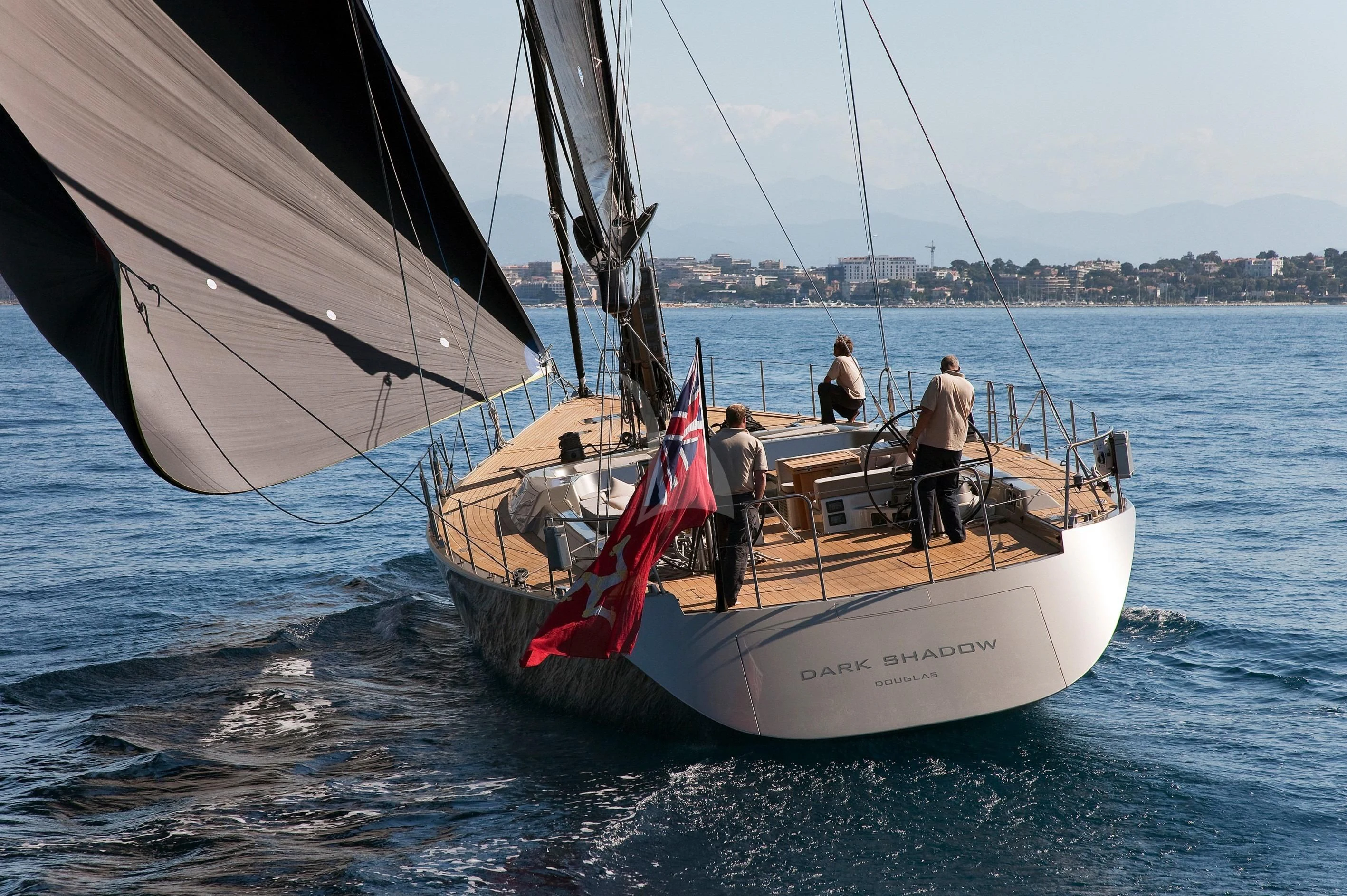 a group of people on a sailboat aboard RUNNING ON FAITH Yacht for Sale