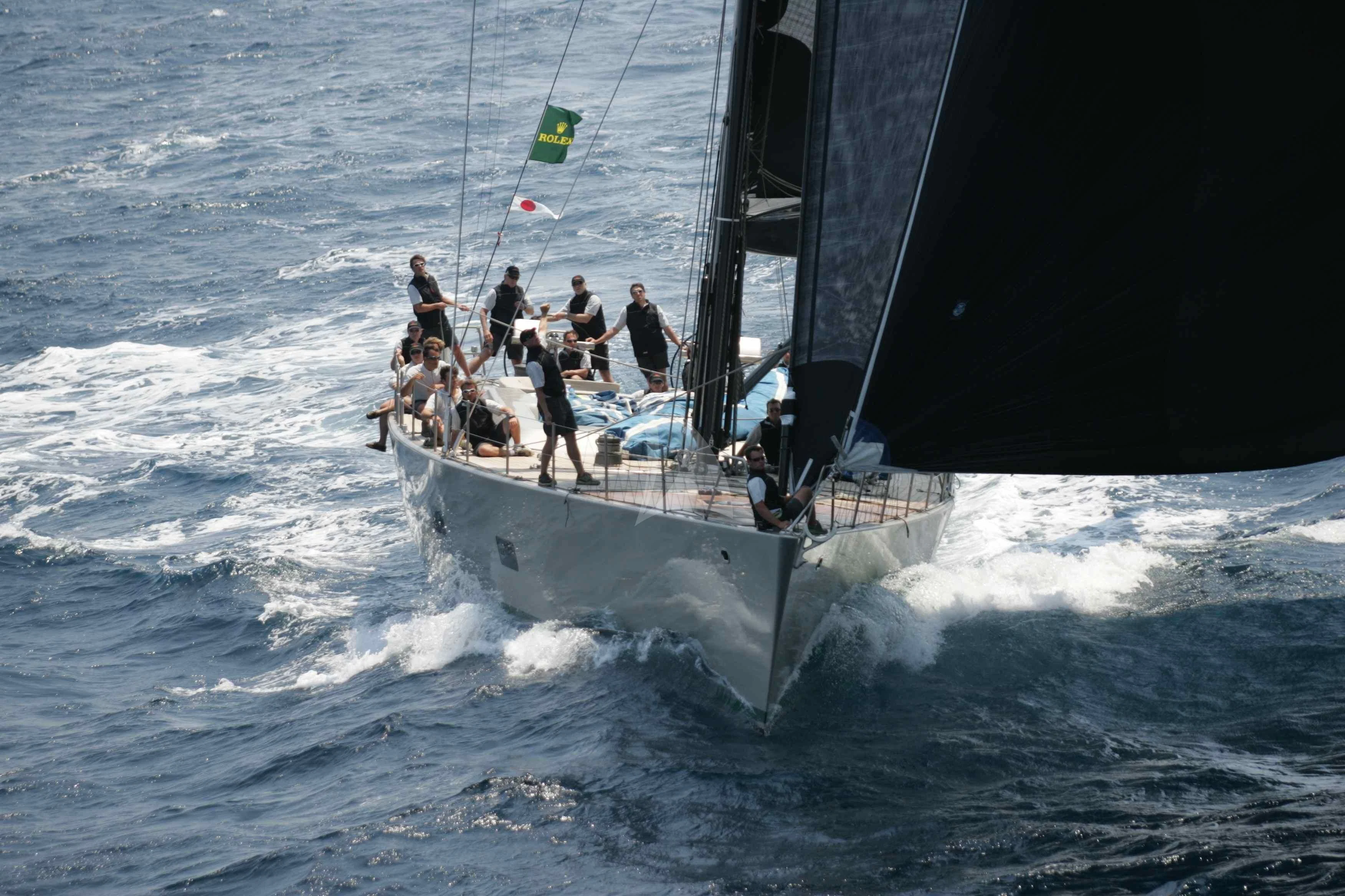 a group of people on a boat aboard RUNNING ON FAITH Yacht for Sale
