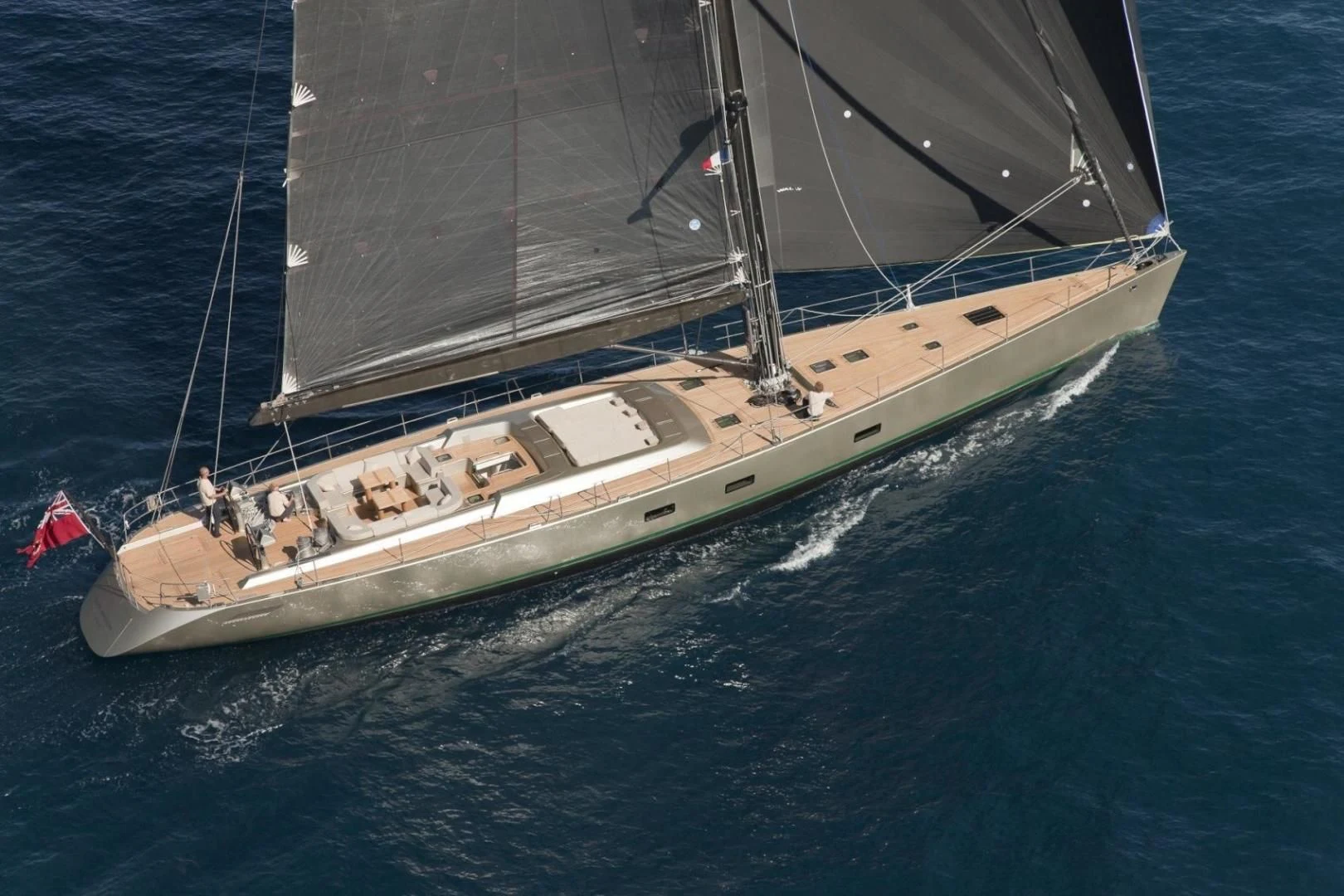 a boat with people on it aboard RUNNING ON FAITH Yacht for Sale