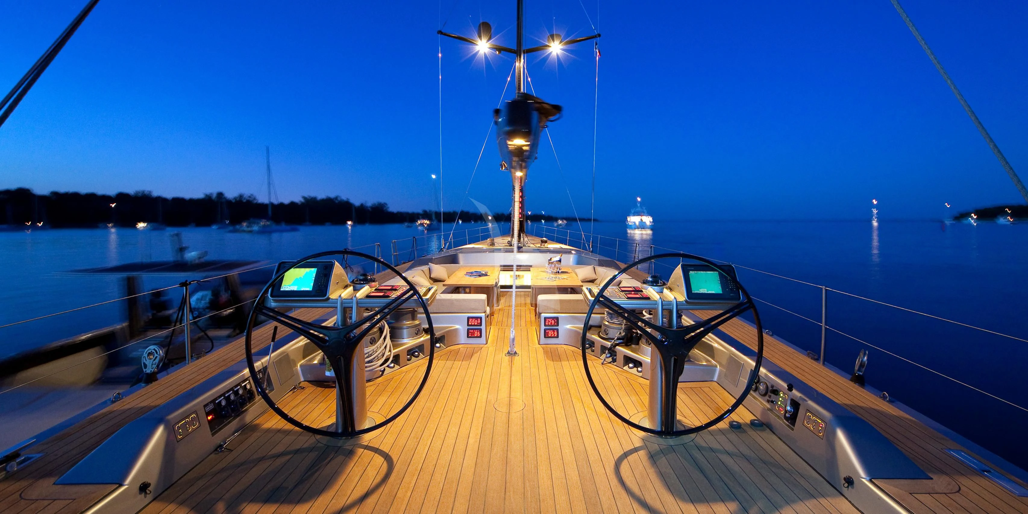 a boat on a body of water aboard RUNNING ON FAITH Yacht for Sale