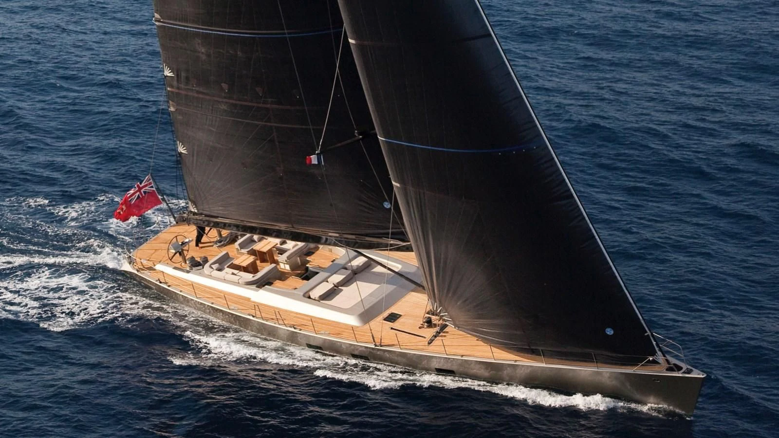 a boat on the water aboard RUNNING ON FAITH Yacht for Sale