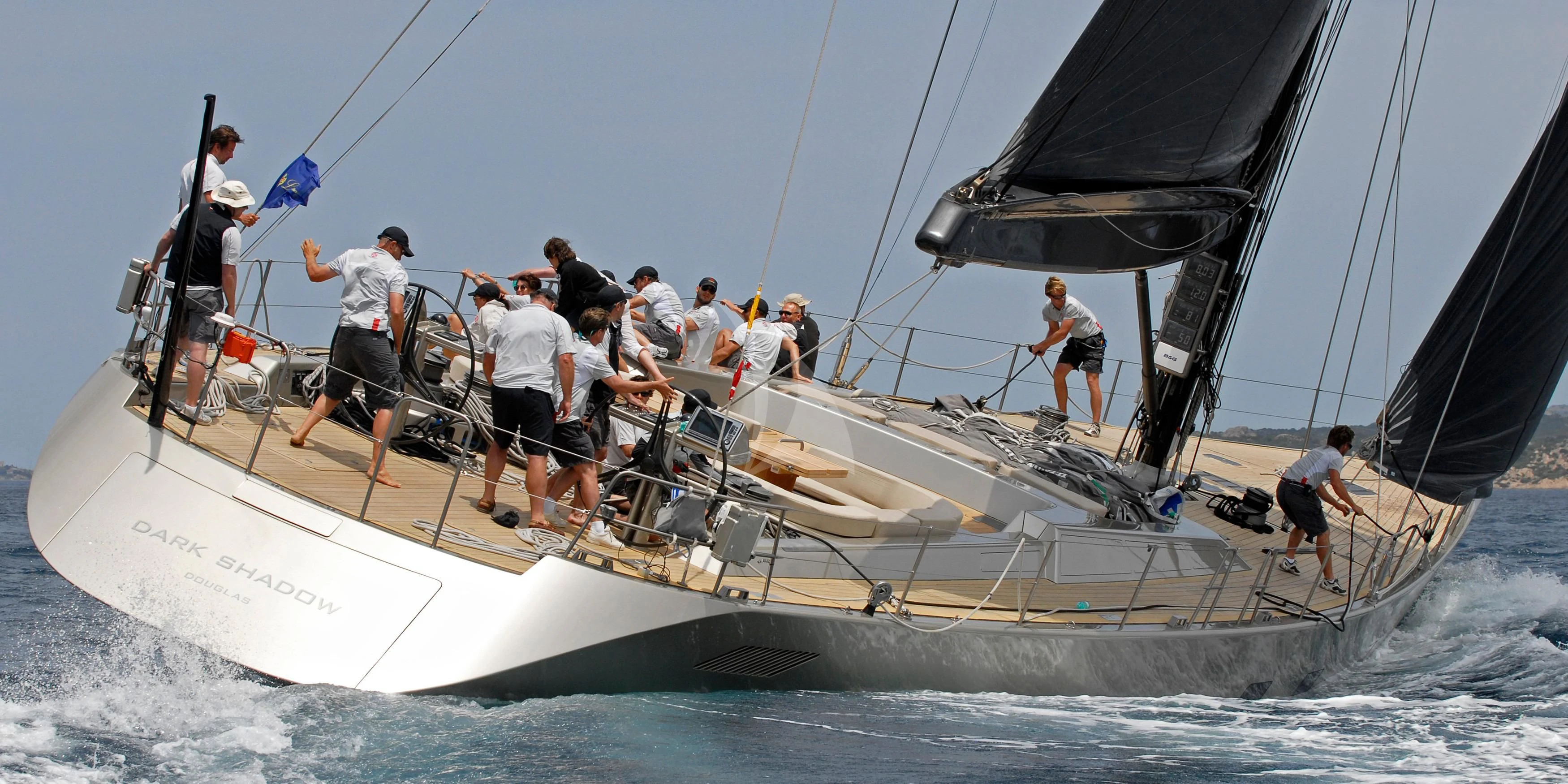 a group of people on a sailboat aboard RUNNING ON FAITH Yacht for Sale