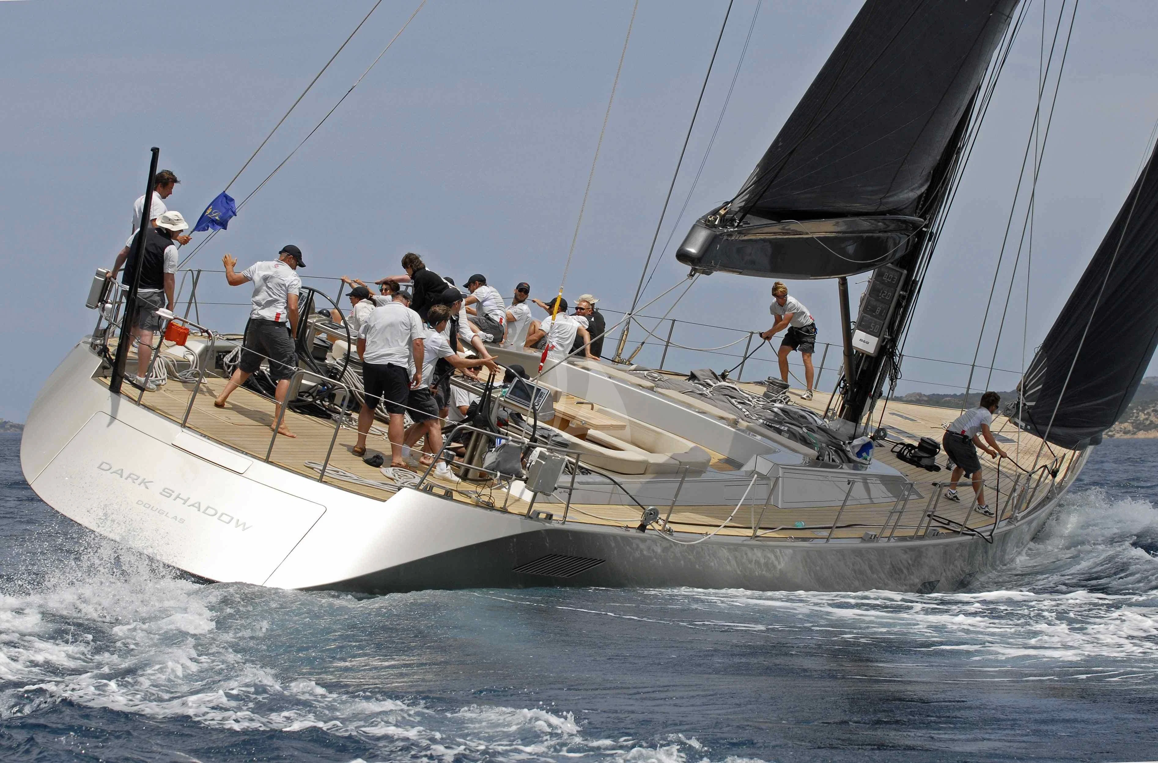 a group of people on a sailboat aboard RUNNING ON FAITH Yacht for Sale