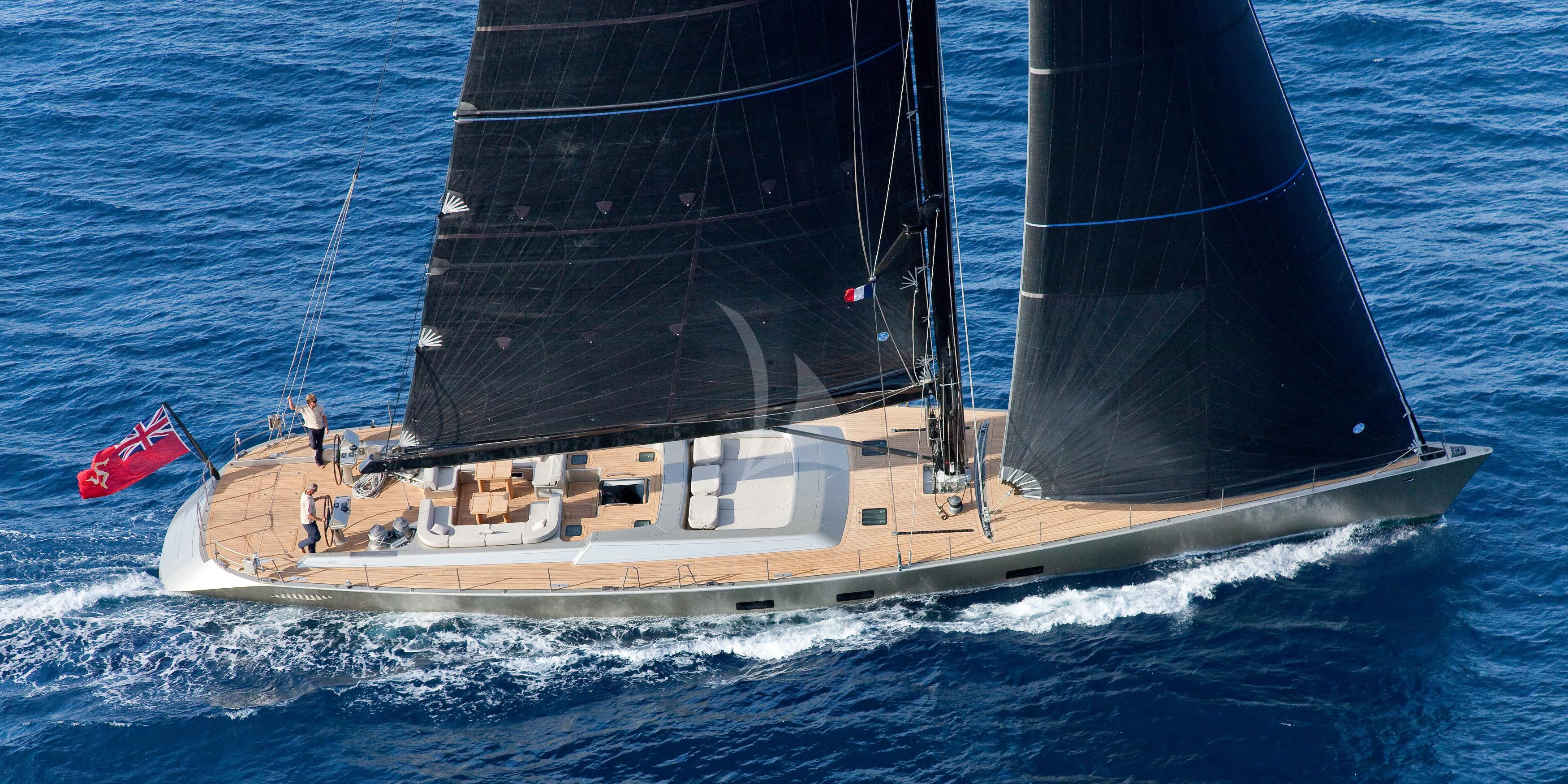 a boat on the water aboard RUNNING ON FAITH Yacht for Sale