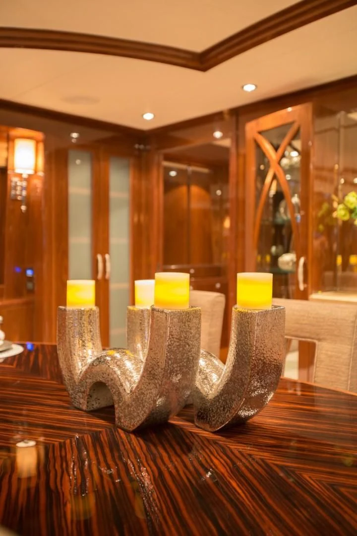 a boot on a table aboard EBITDA Yacht for Sale
