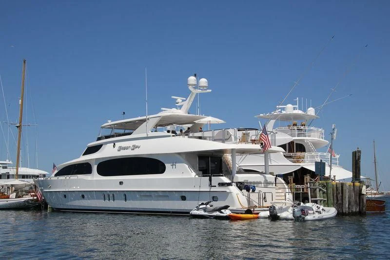 a large white boat in the water aboard EBITDA Yacht for Sale