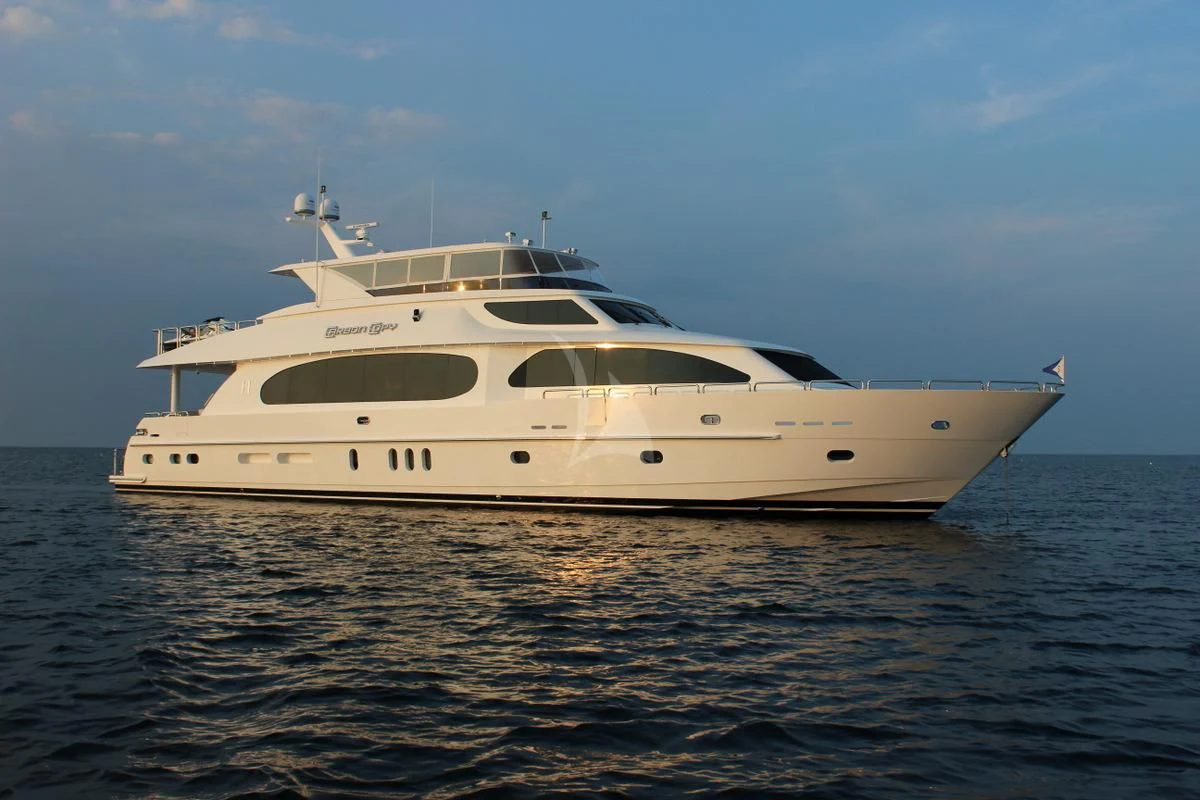 a white yacht in the water aboard EBITDA Yacht for Sale