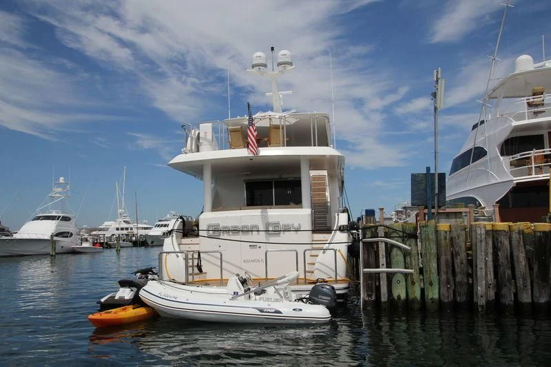 a group of boats are parked in the water aboard EBITDA Yacht for Sale