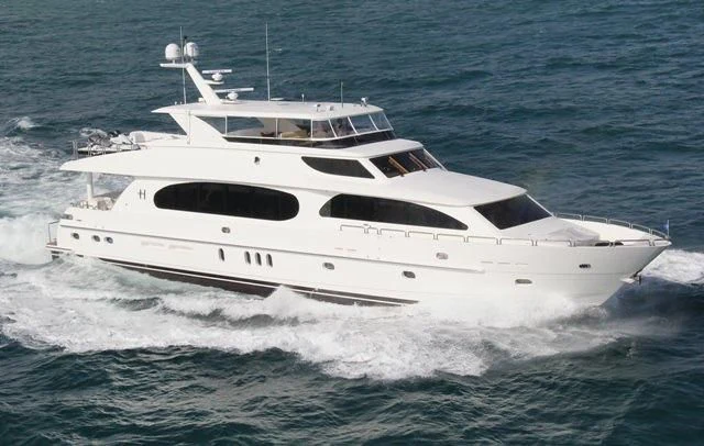 a white yacht in the water aboard EBITDA Yacht for Sale