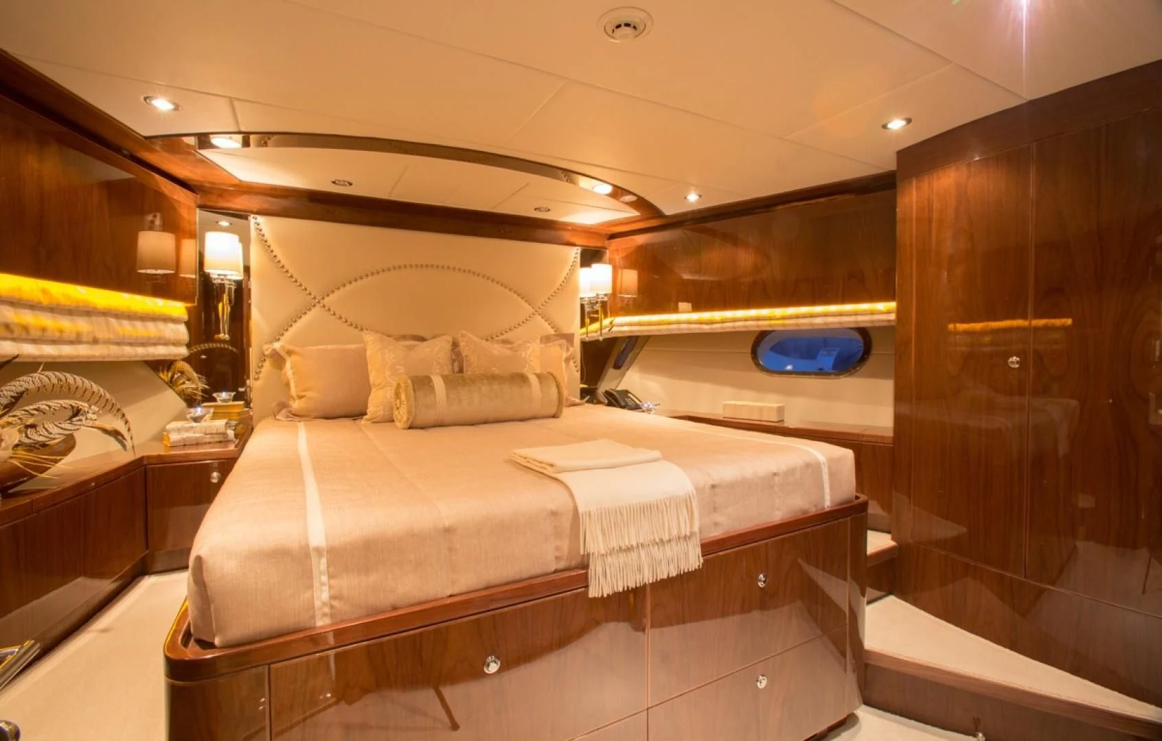 a bed in a room aboard EBITDA Yacht for Sale