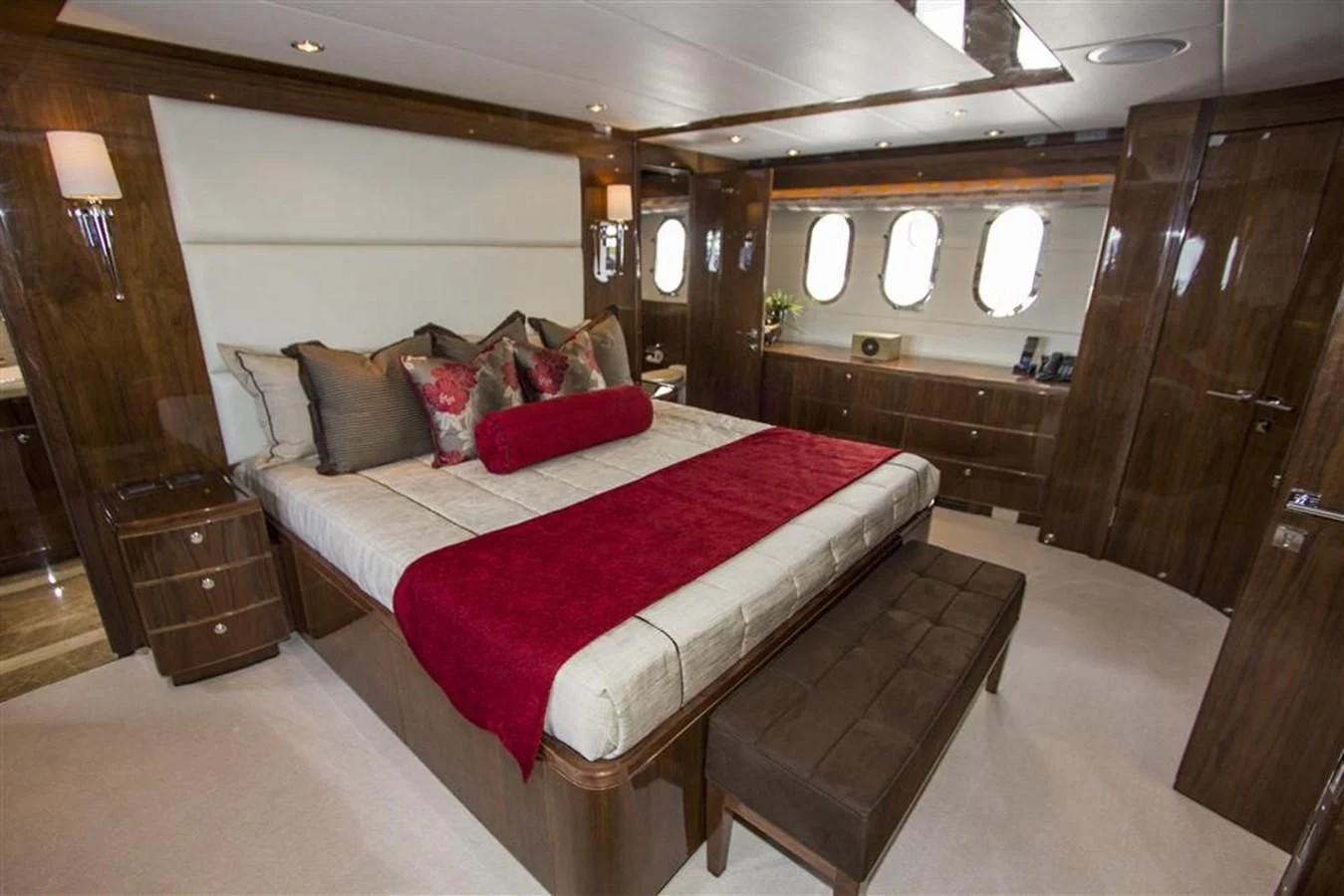 a bed in a room aboard EBITDA Yacht for Sale