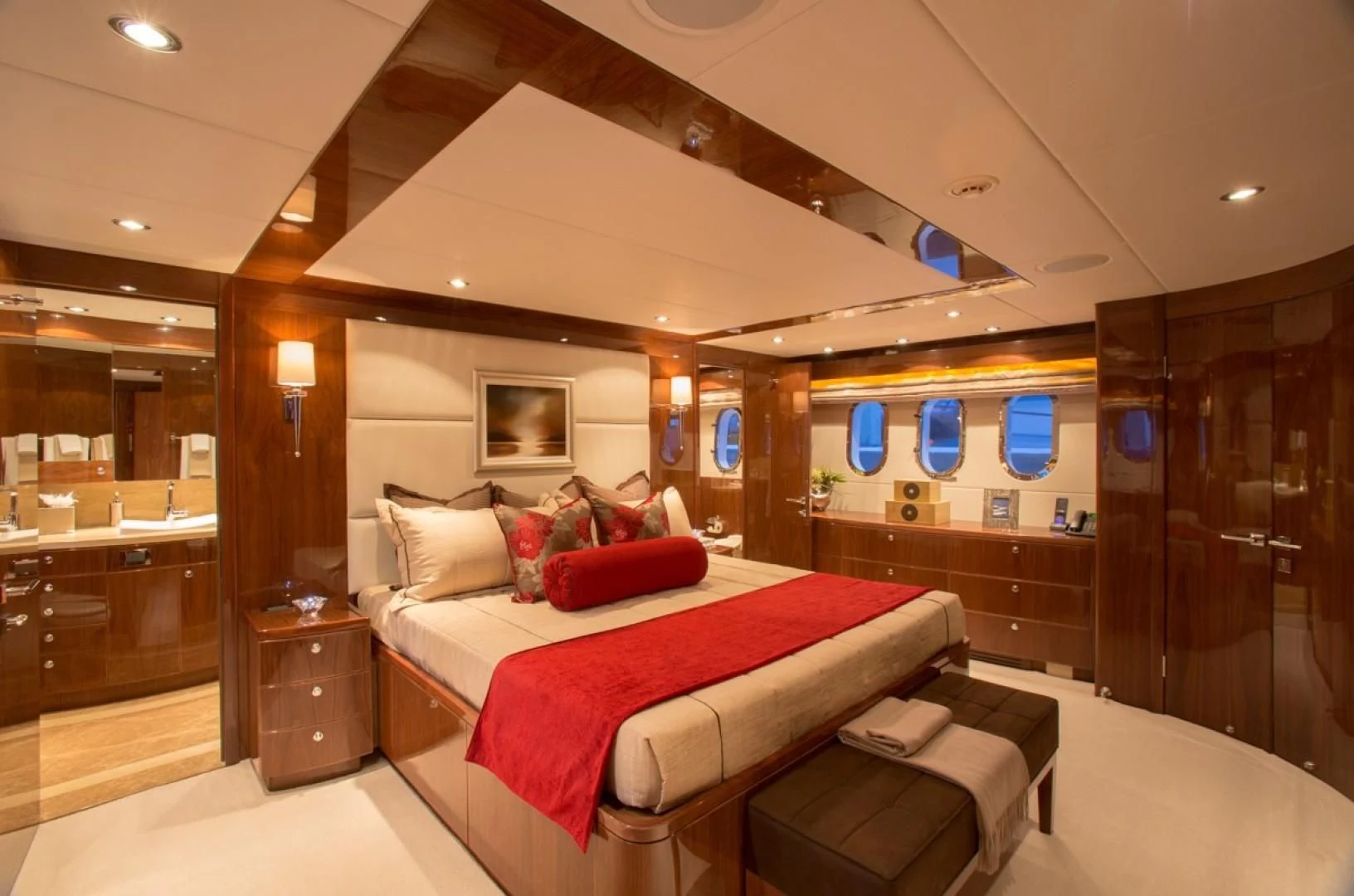 a hotel room with a bed aboard EBITDA Yacht for Sale