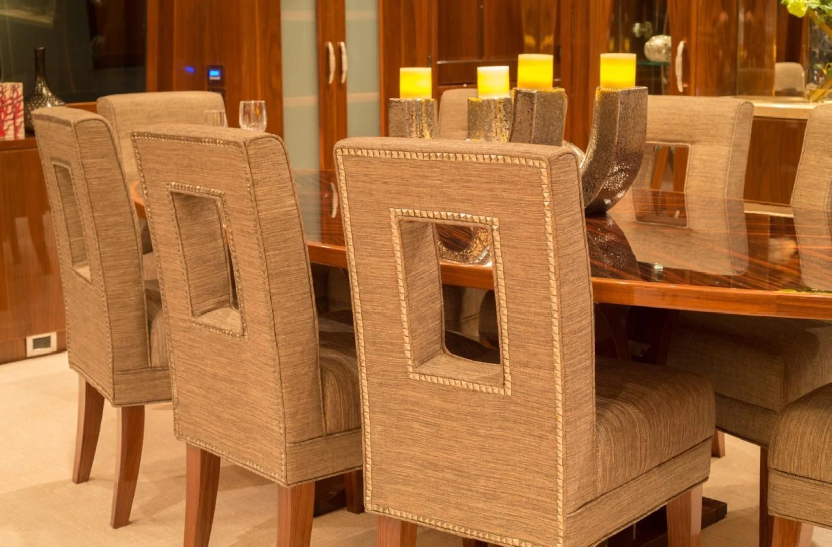 a chair and a table aboard EBITDA Yacht for Sale