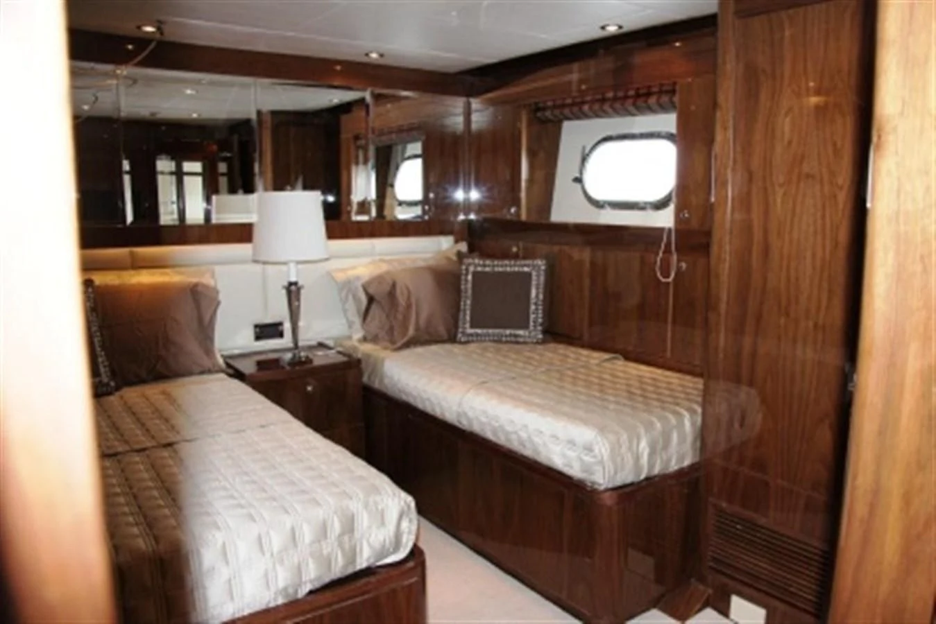 a couple of beds in a cabin aboard EBITDA Yacht for Sale
