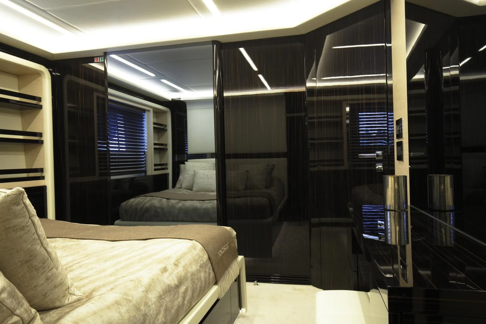 a room with a bed and a couch aboard NOVASTAR Yacht for Sale