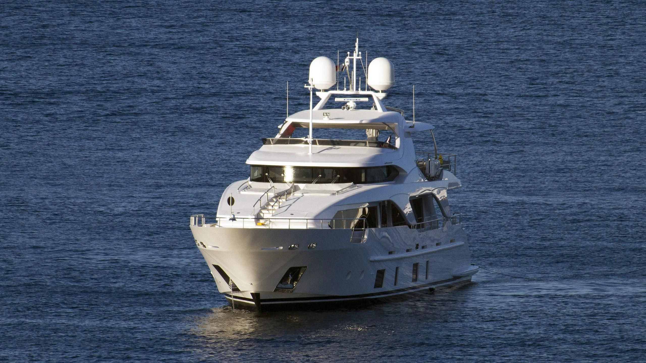 a white boat in the water aboard NOVASTAR Yacht for Sale