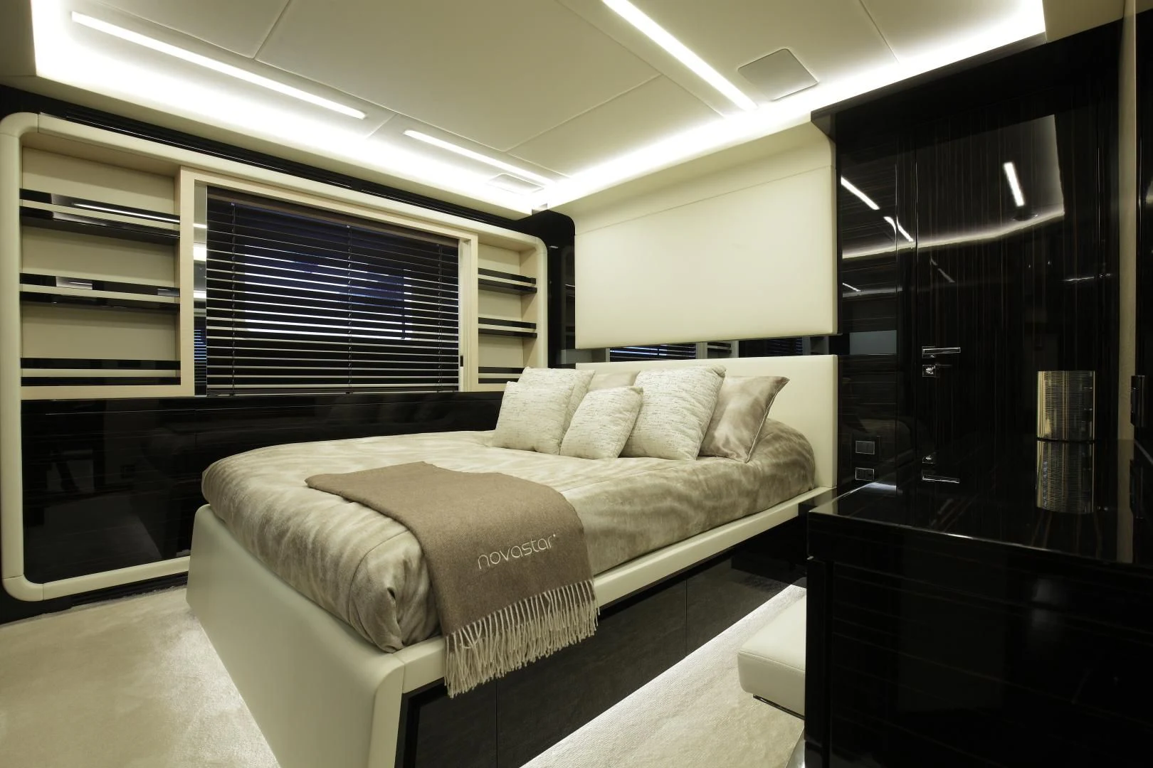 a bed in a room aboard NOVASTAR Yacht for Sale