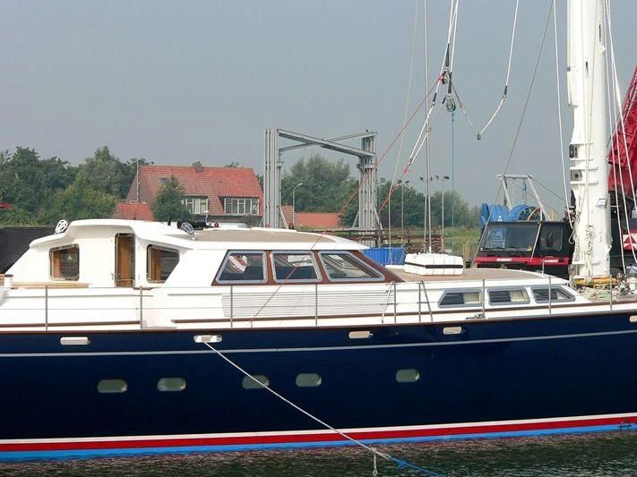 a boat parked in a harbor aboard PITUXIN VI Yacht for Sale