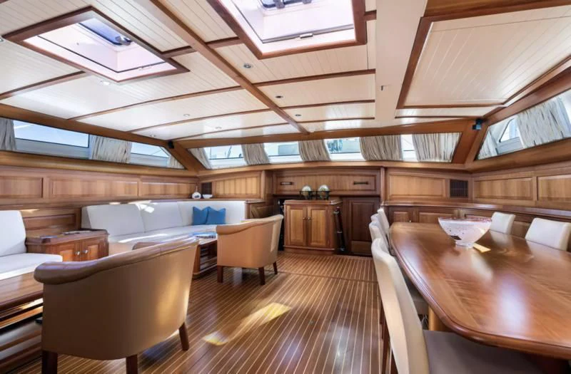 a room with wooden floors and a wood floor aboard PITUXIN VI Yacht for Sale