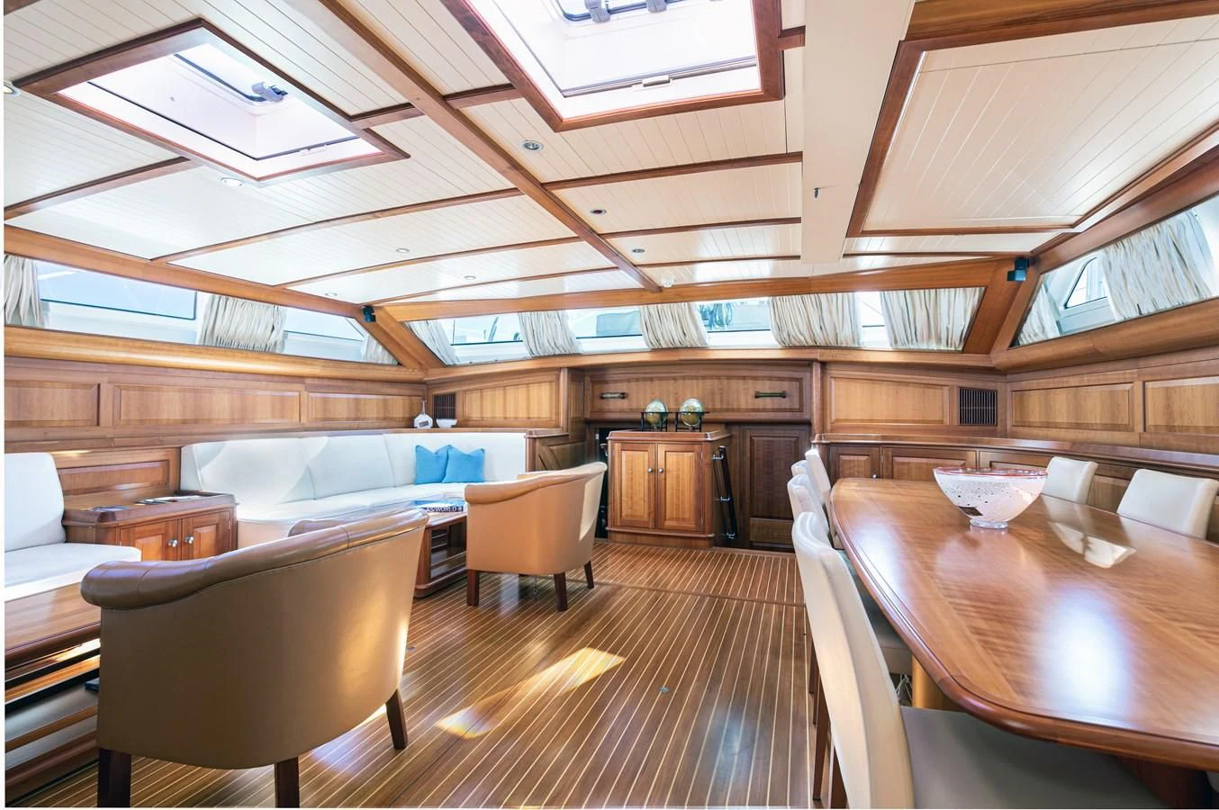 a room with wooden floors and a wood floor aboard PITUXIN VI Yacht for Sale
